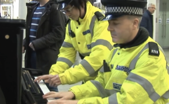 Police Officers Surprise Commuters with Impromptu Piano Duet at Train Station %%random%%